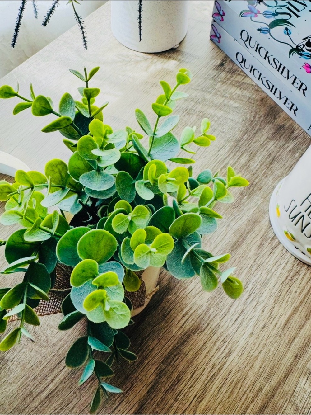 Green Faux Eucalyptus Arrangement in Cream Pot